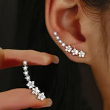 Valeria™ – Pendientes Trepadores de Brillo Floral