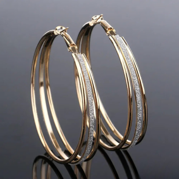 Pendientes de aro retro en acabado dorado