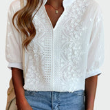 Blusa con Detalles de Encaje y Mangas Abullonadas