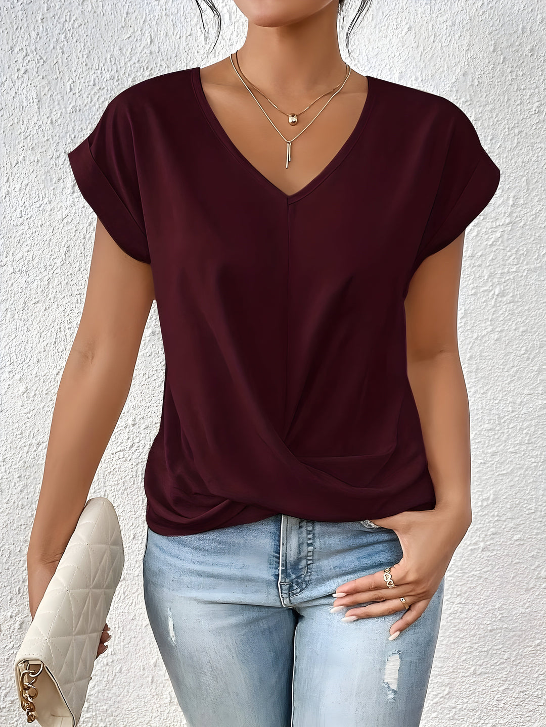 MARTA™ | Top con escote en V y detalle cruzado que favorece