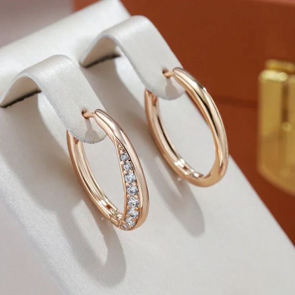 Pendientes sencillos en acabado dorado