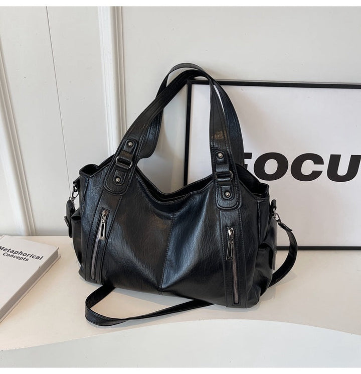 NOEMIE™ - Tote de piel atemporal