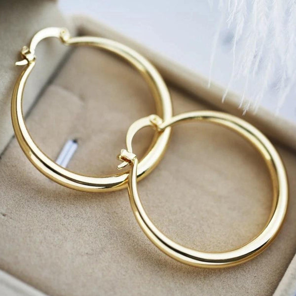 Pendientes de aro grandes en acabado dorado