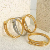 Pulsera de oro retorcida