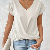 MARTA™ | Top con escote en V y detalle cruzado que favorece