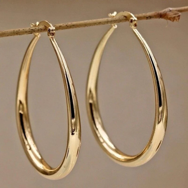 Pendientes de aro en acabado dorado con aire vintage