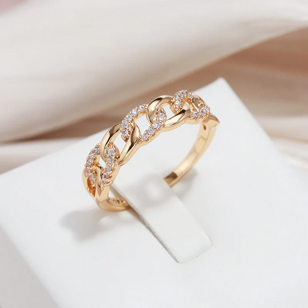 Anillo estrecho con efecto trenzado en acabado dorado