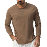 Camiseta de manga larga de color liso con cuello redondo para hombre